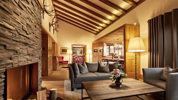 Suite, Fireplace, Valley View | Living room | TV, DVD player, pay movies