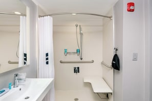Shower, designer toiletries, hair dryer, towels