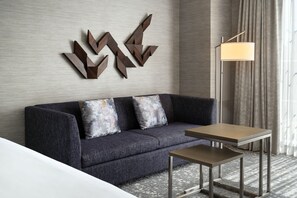Premium bedding, down comforters, pillowtop beds, minibar