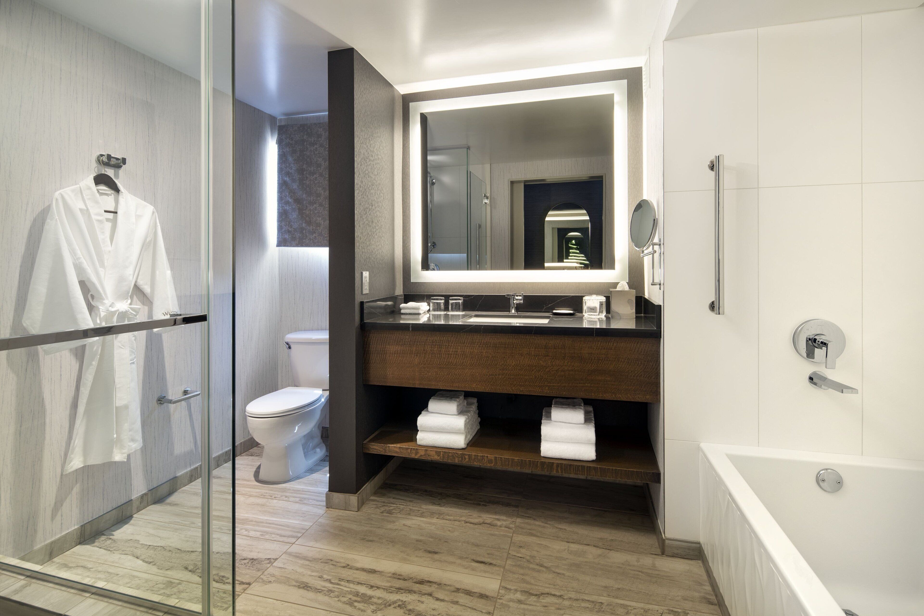 separate bathtub and shower, designer toiletries, hair dryer, bathrobes