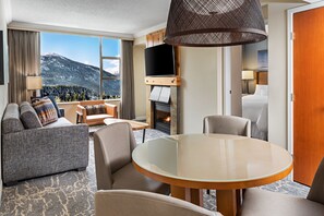 Suite, 1 Bedroom, Fireplace | Living room | 55-inch Smart TV with cable channels, TV, Netflix