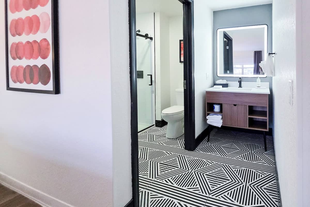 Pillowtop beds, desk, blackout drapes, iron/ironing board