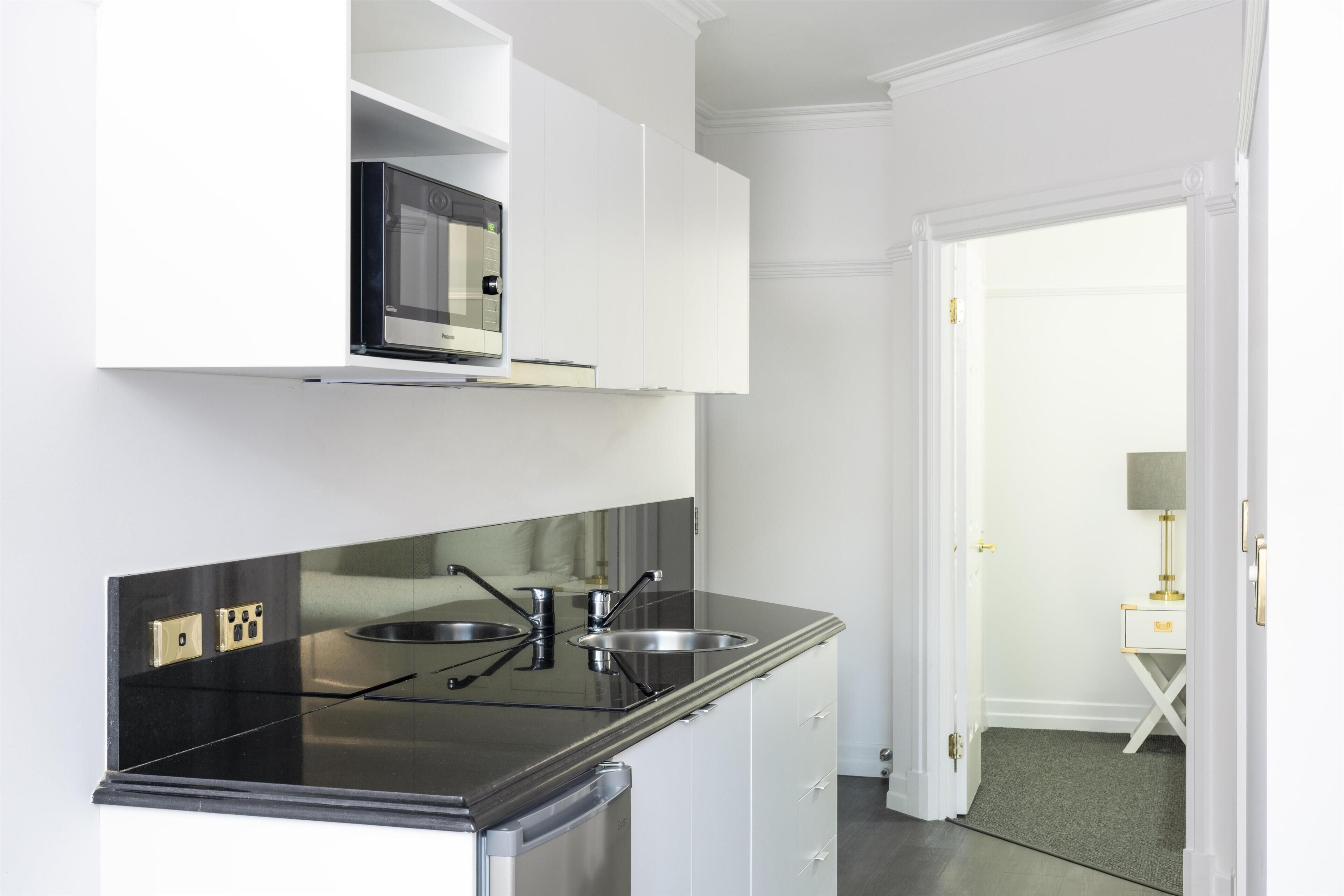 One Bedroom Apartment | In-room safe, laptop workspace, blackout drapes, soundproofing