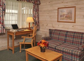 Suite, 2 Queen Beds, Non Smoking | Living area | 32-inch flat-screen TV with digital channels, TV