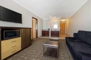 Suite, 1 King Bed, Non Smoking, Refrigerator & Microwave | Desk, iron/ironing board, free WiFi, bed sheets