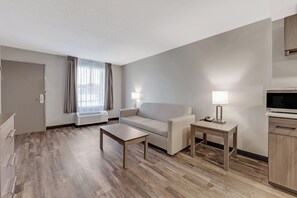 Suite, 1 King Bed, Non Smoking | Blackout drapes, free WiFi, bed sheets