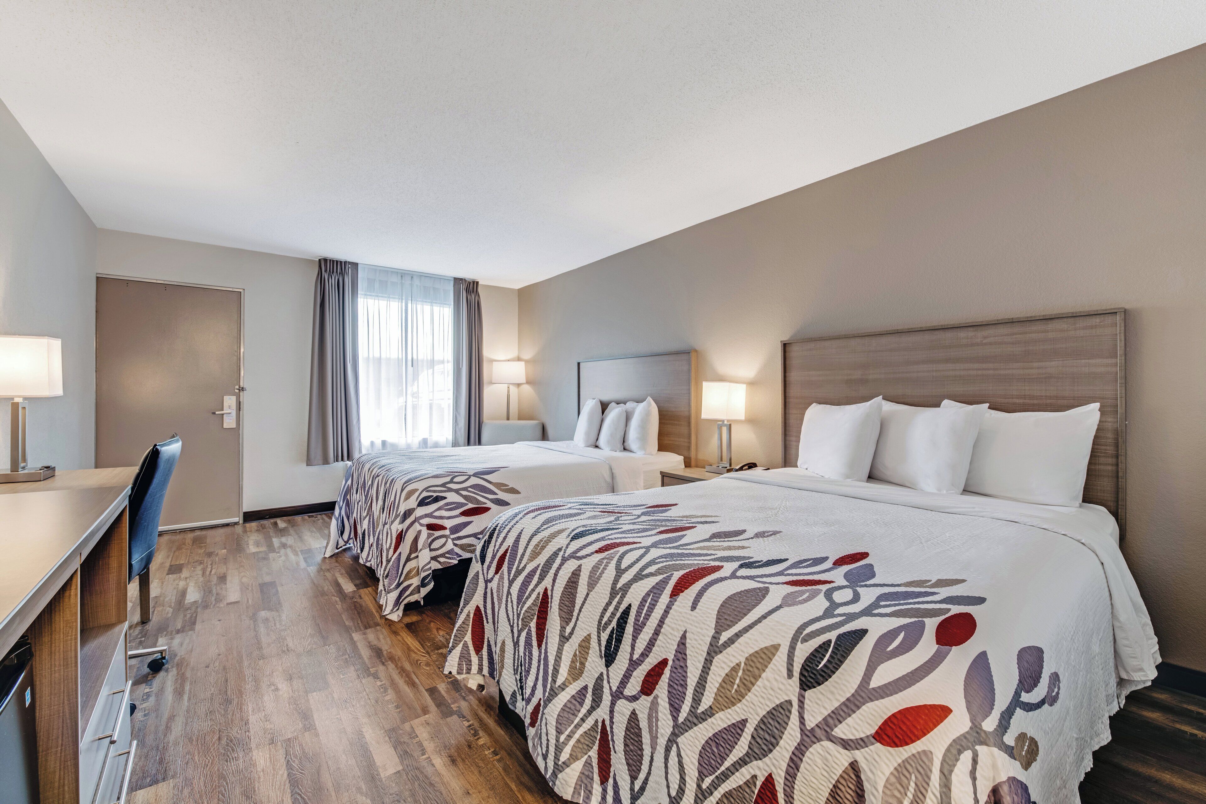 Deluxe Room, 2 Queen Beds, Non Smoking | Blackout drapes, free WiFi, bed sheets