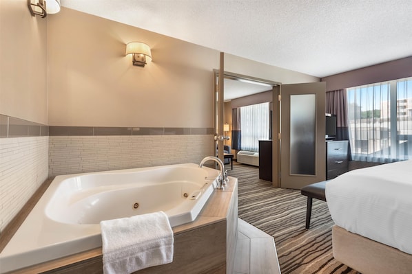 Suite, 1 King Bed, Non Smoking, Jetted Tub | Premium bedding, pillowtop beds, desk, blackout drapes