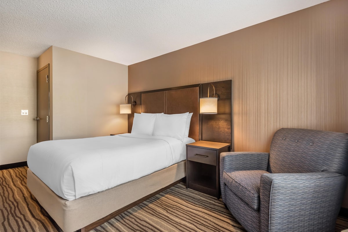 Premium bedding, pillow-top beds, desk, blackout curtains