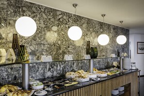 Daily buffet breakfast (EUR 18 per person)