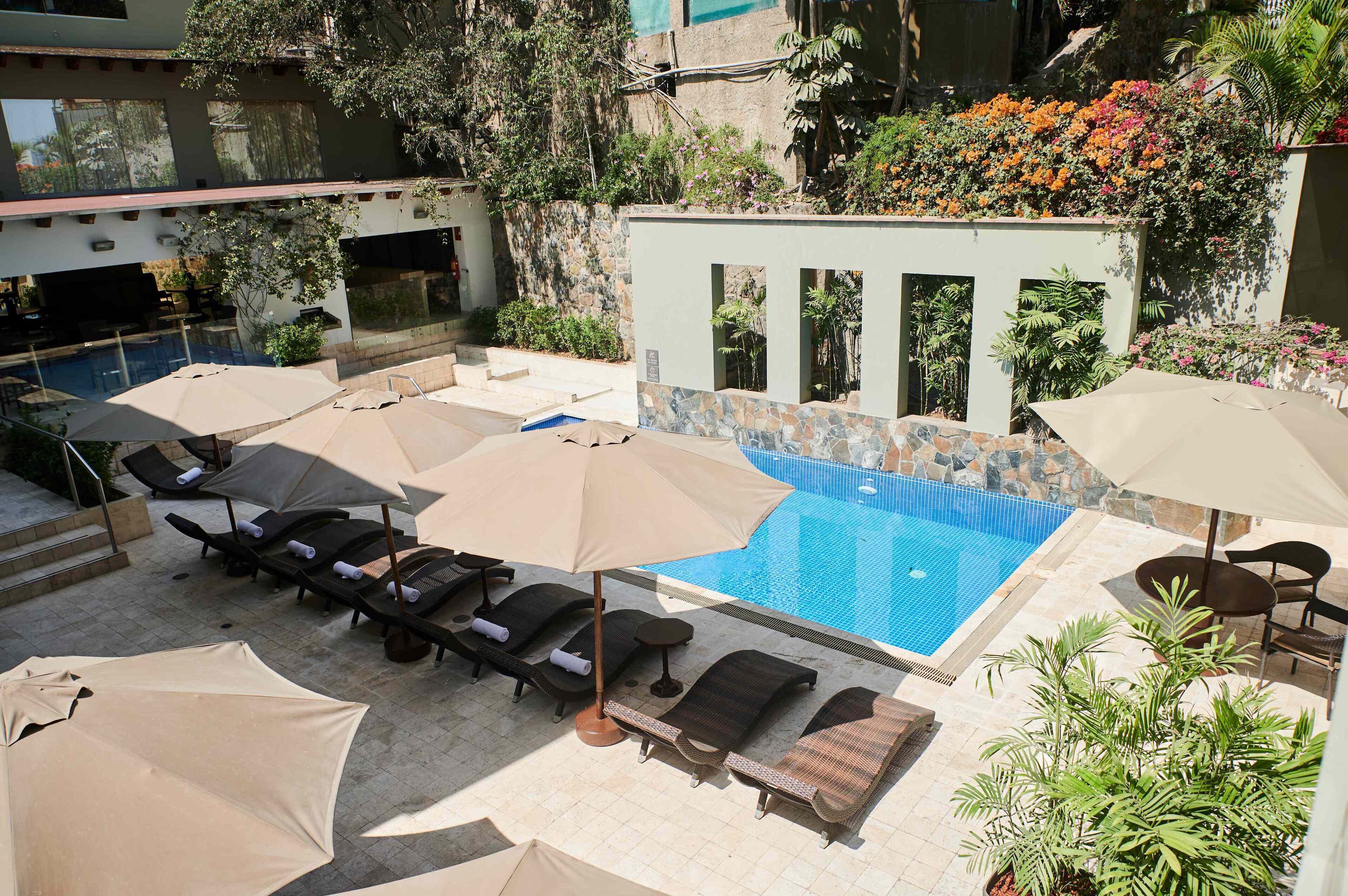 outdoor pool, pool loungers