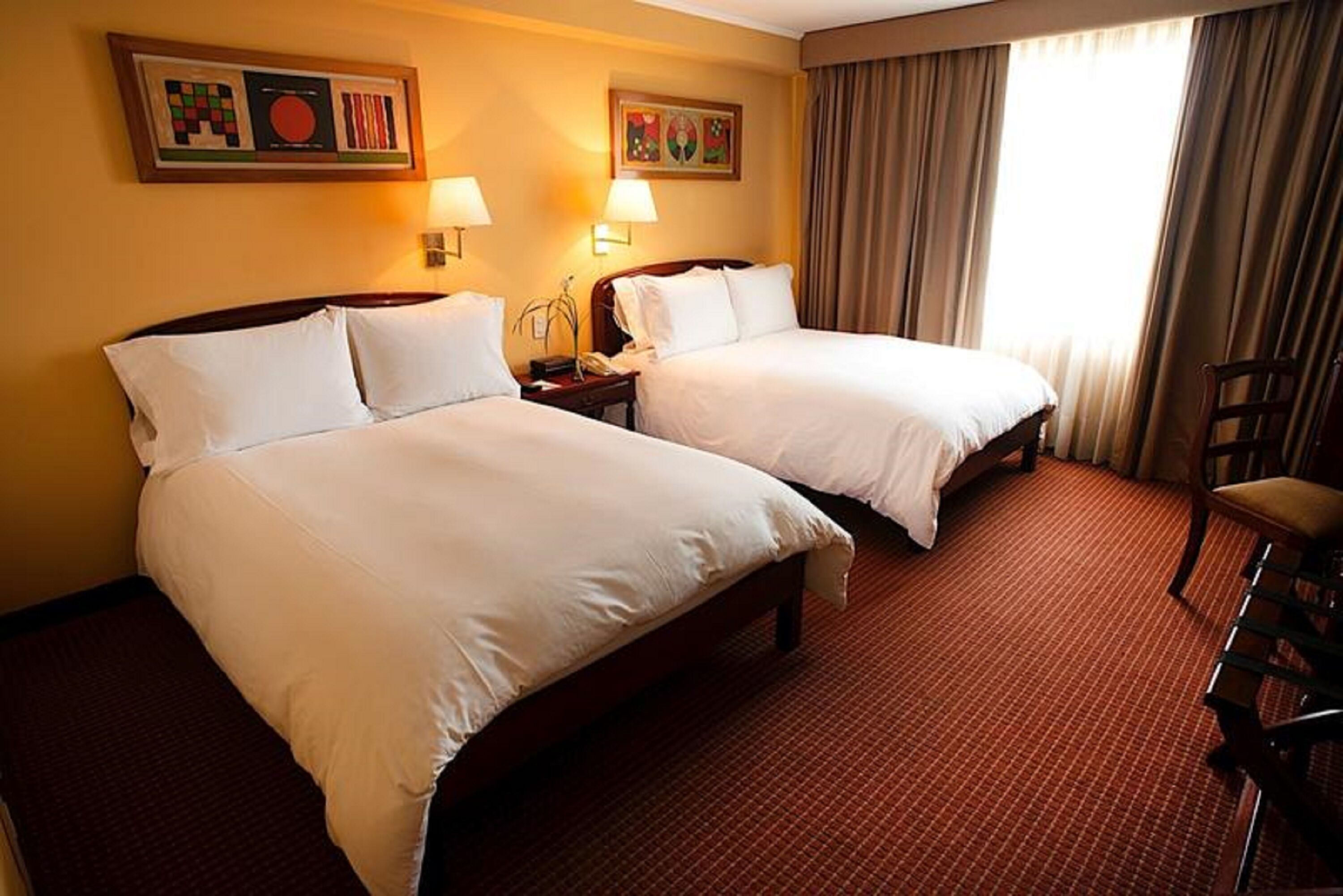 standard twin room | memory-foam beds, minibar, in-room safe, blackout curtains