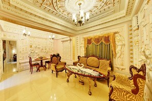 Deluxe Single Room, 1 King Bed | Living area | 50-inch LCD TV with digital channels, TV, DVD player - Ambica Empire (Chennai)