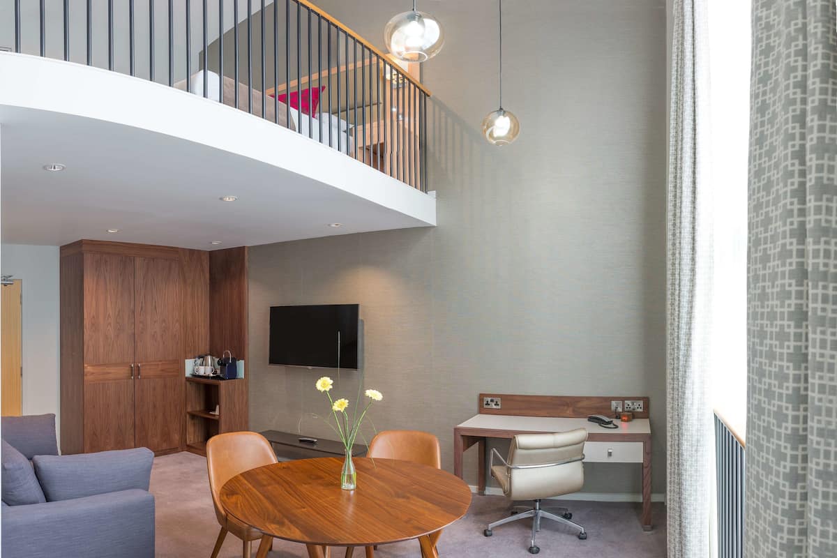Suite, 1 King Bed, Non Smoking | Iron/ironing board, cribs (surcharge), rollaway beds (surcharge)