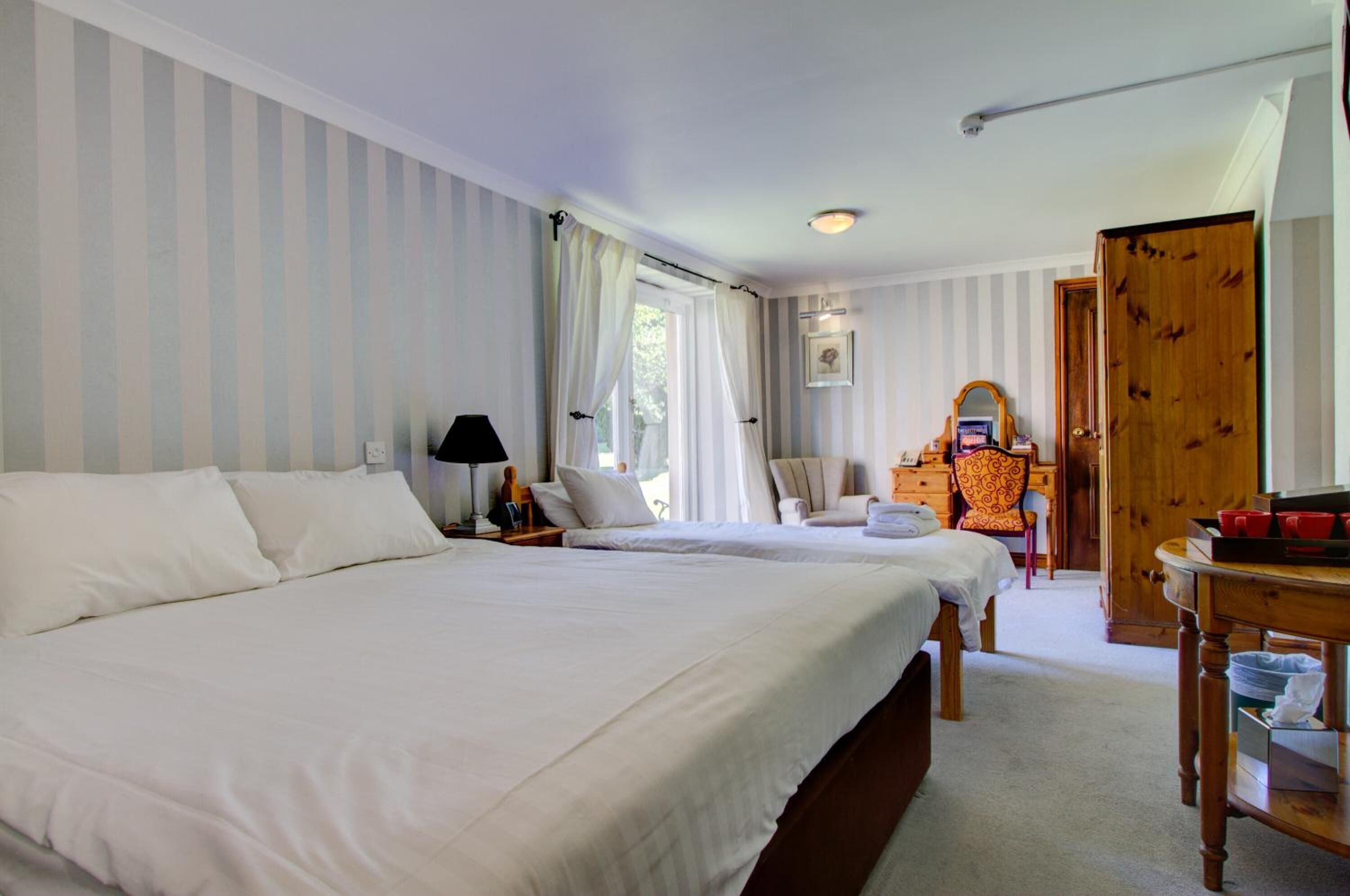 individually decorated, desk, iron/ironing board, free cots/infant beds