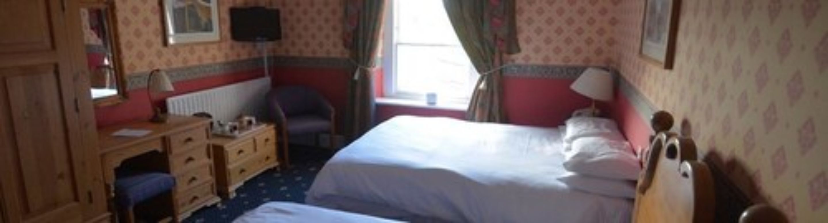 family room | individually decorated, desk, iron/ironing board, free cots/infant beds