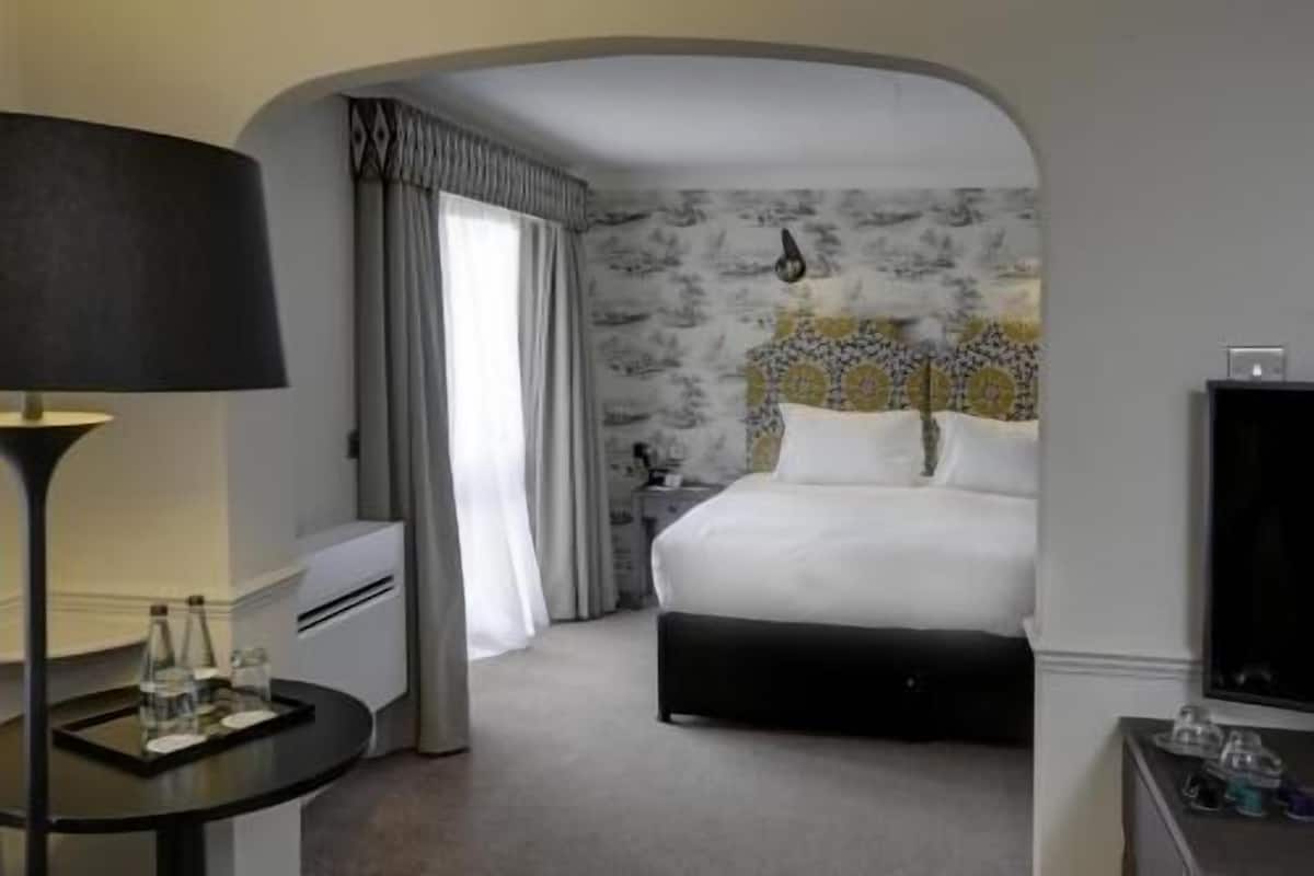 In-room safe, individually decorated, desk, blackout curtains