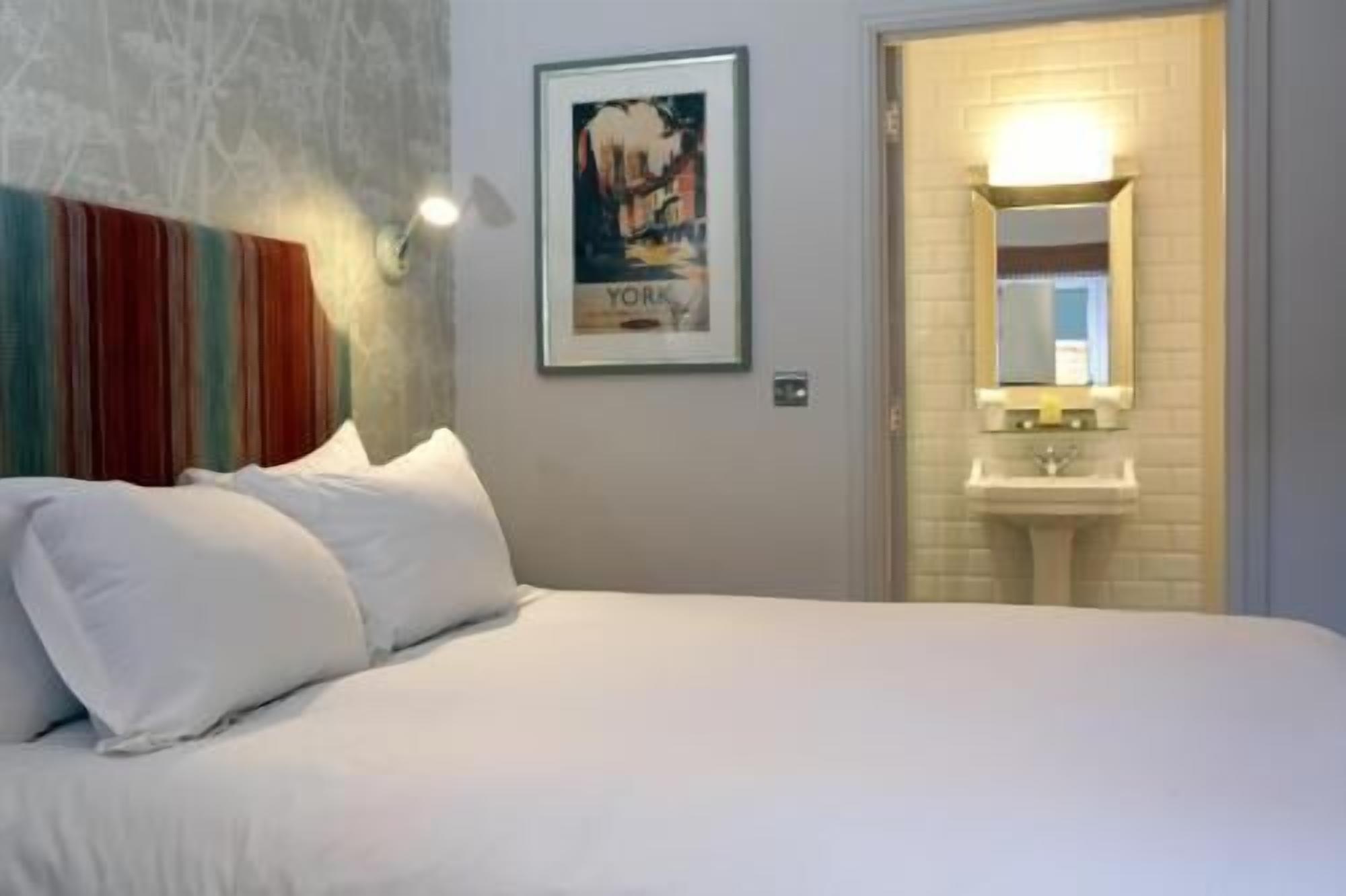 In-room safe, individually decorated, desk, blackout curtains