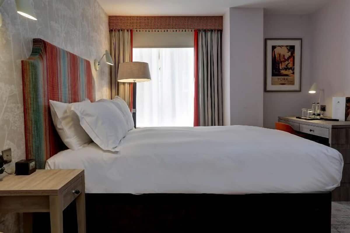 In-room safe, individually decorated, desk, blackout curtains