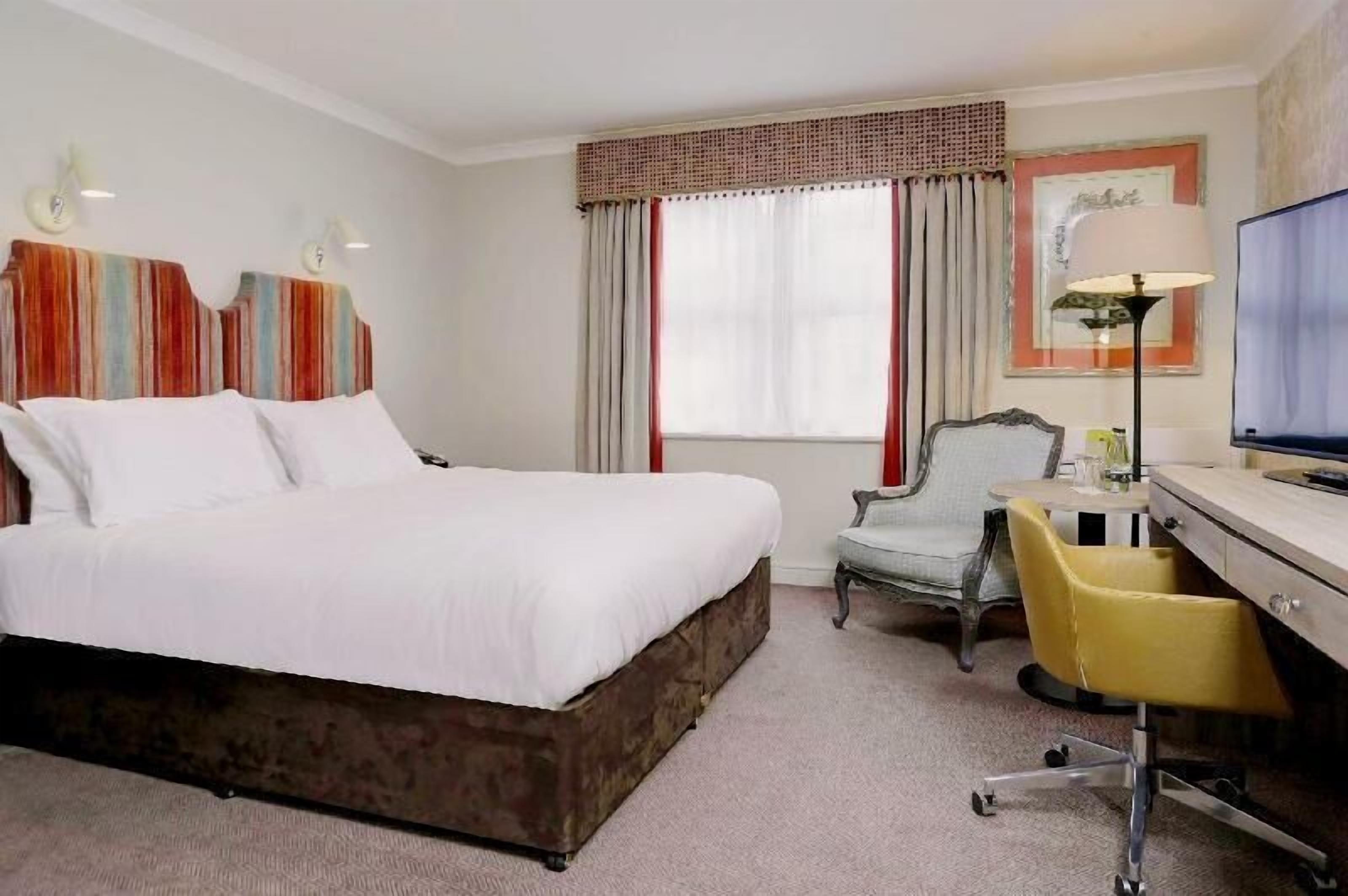 In-room safe, individually decorated, desk, blackout curtains