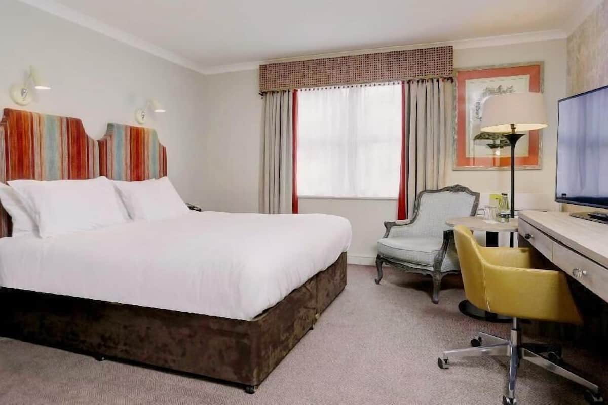 In-room safe, individually decorated, desk, blackout curtains