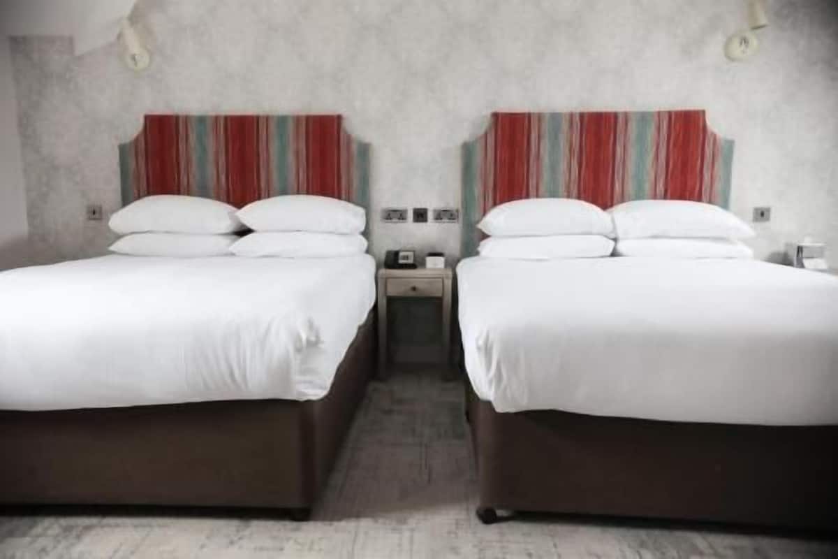 In-room safe, individually decorated, desk, blackout curtains