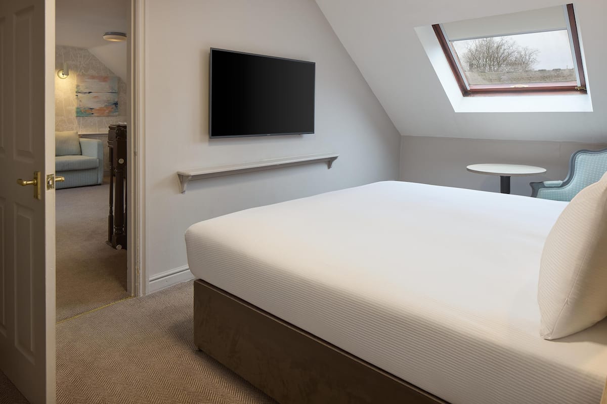 Family Room (2 Rooms) | In-room safe, individually decorated, desk, blackout drapes