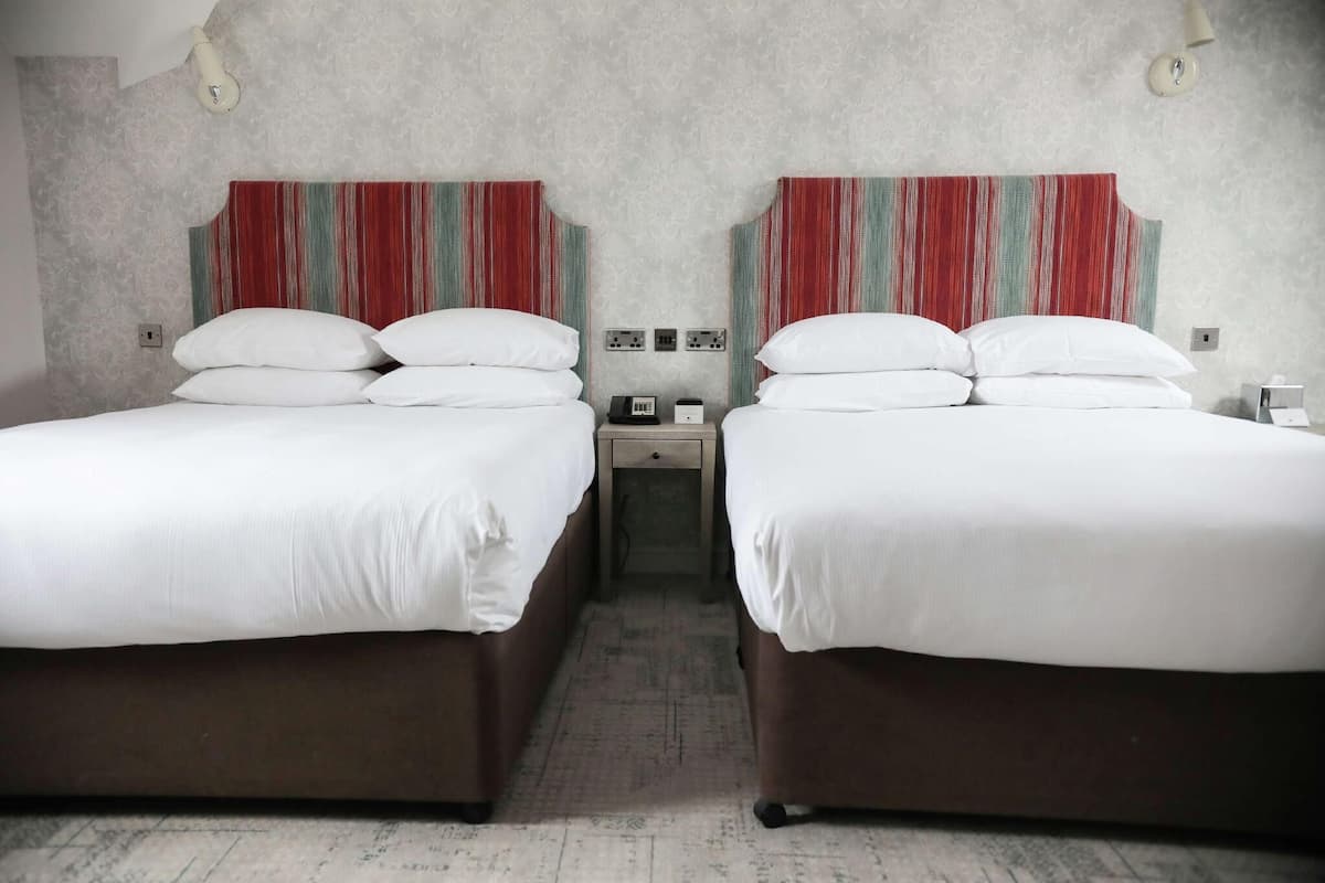 In-room safe, individually decorated, desk, blackout curtains