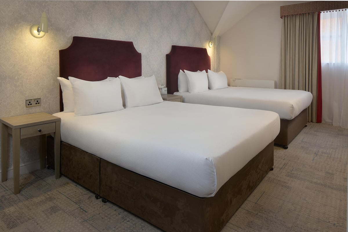 Room, 2 Double Beds | In-room safe, individually decorated, desk, blackout drapes