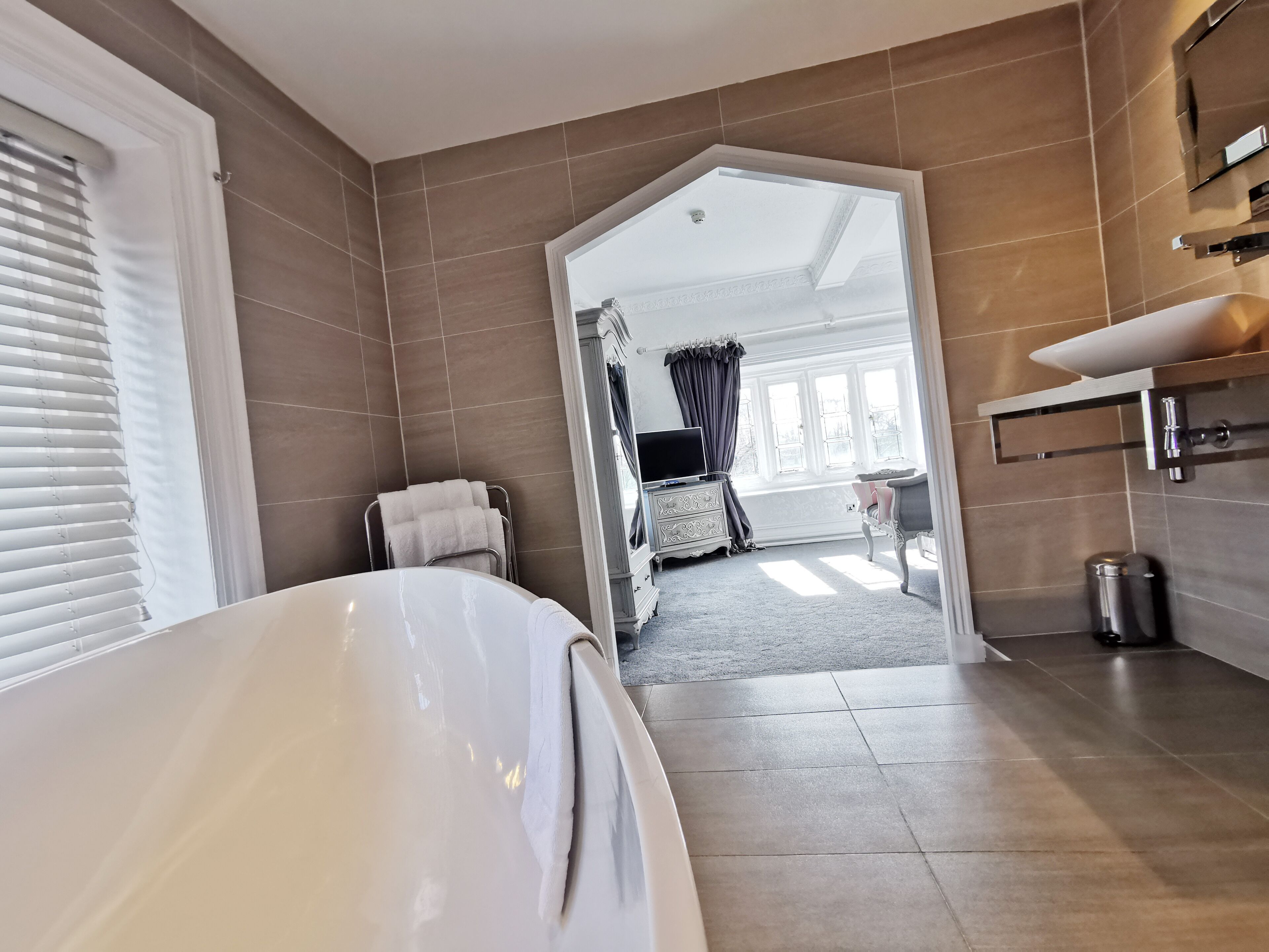 suite | bathroom | designer toiletries, hair dryer, towels