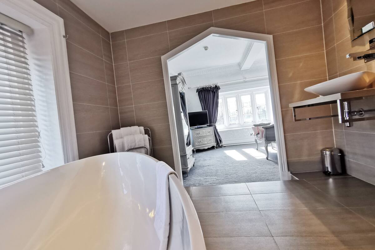 suite | bathroom | designer toiletries, hair dryer, towels