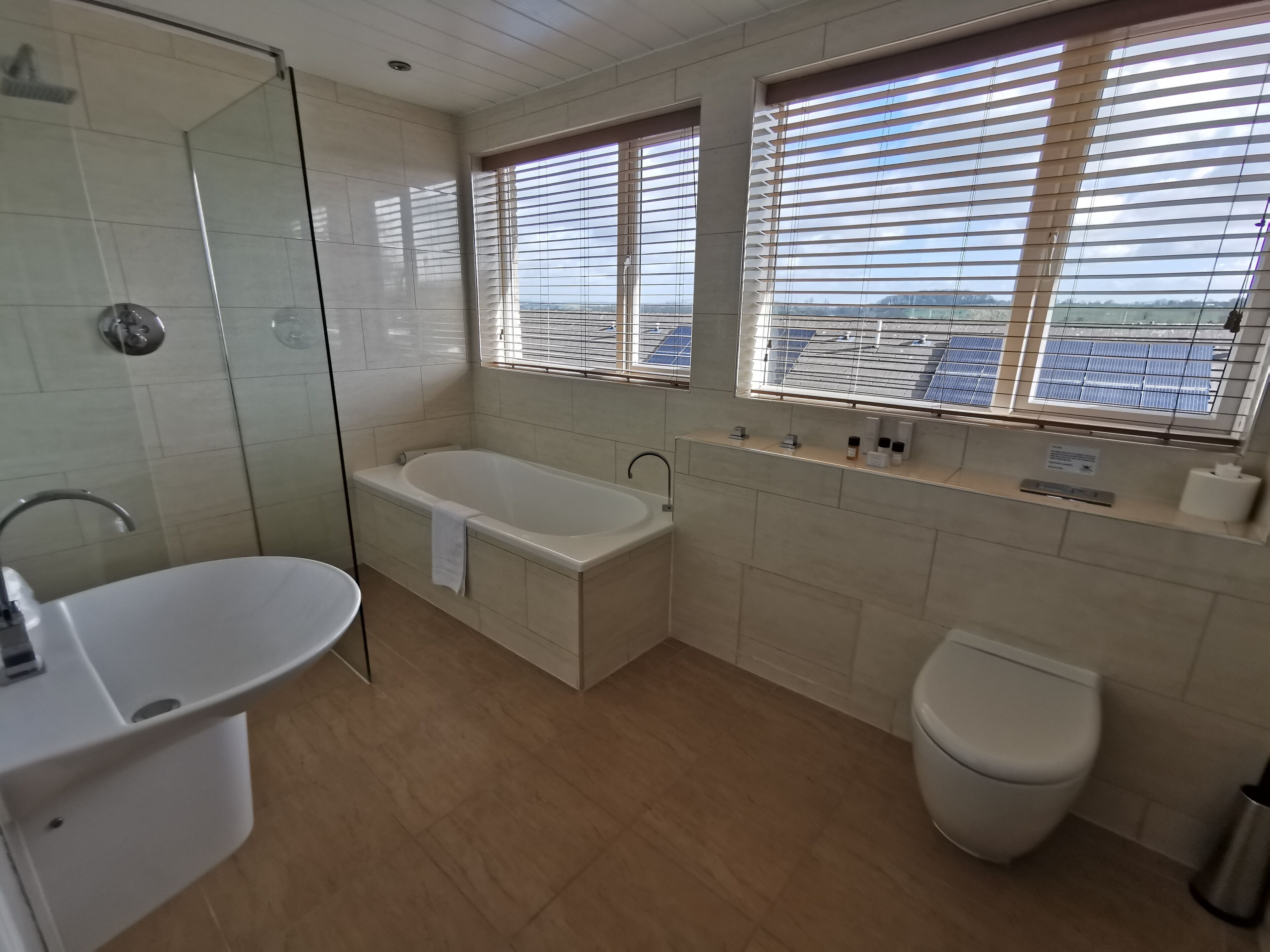 superior double room | bathroom | designer toiletries, hair dryer, towels