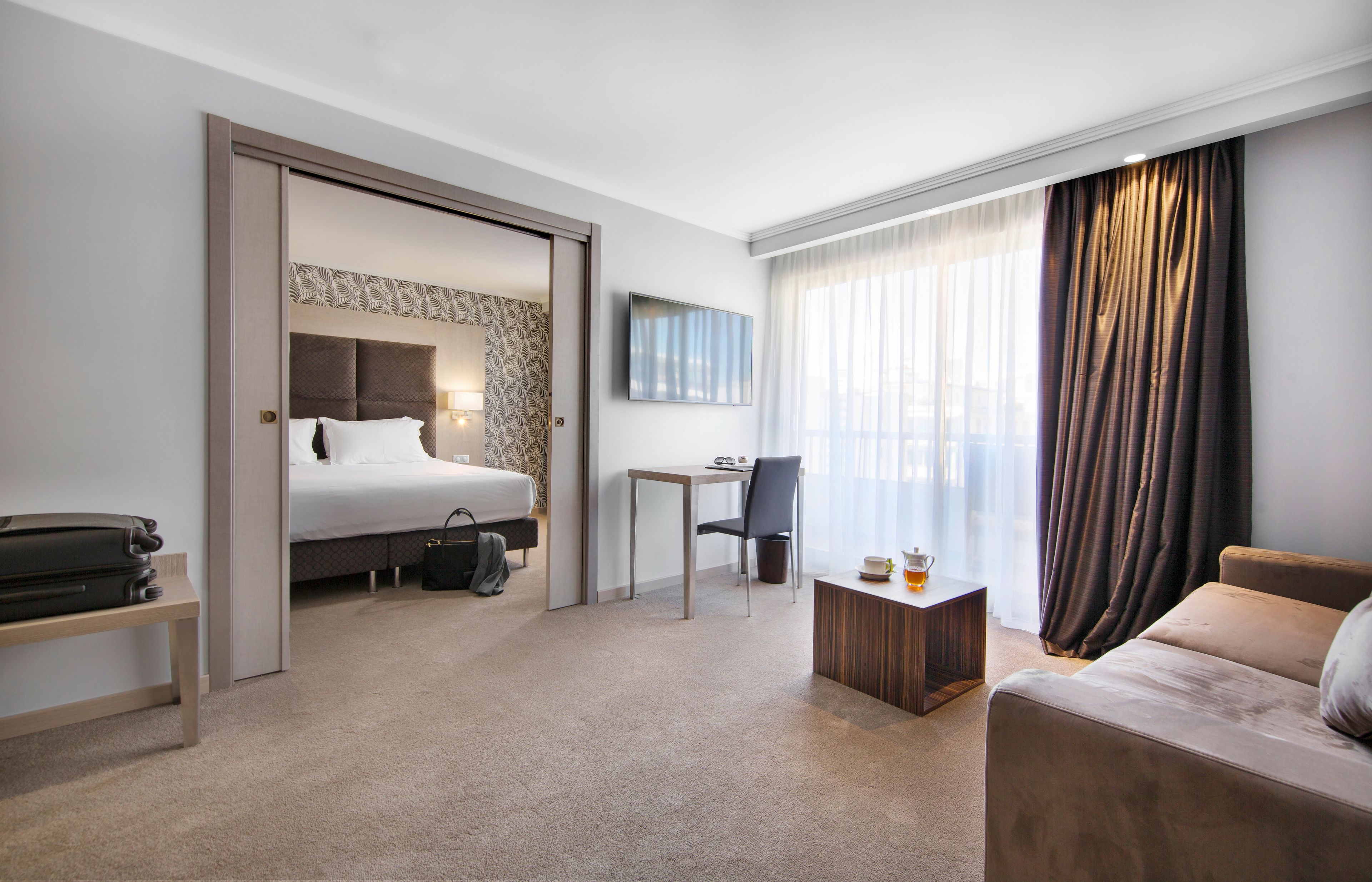 deluxe suite, balcony | 1 bedroom, in-room safe, individually decorated, individually furnished