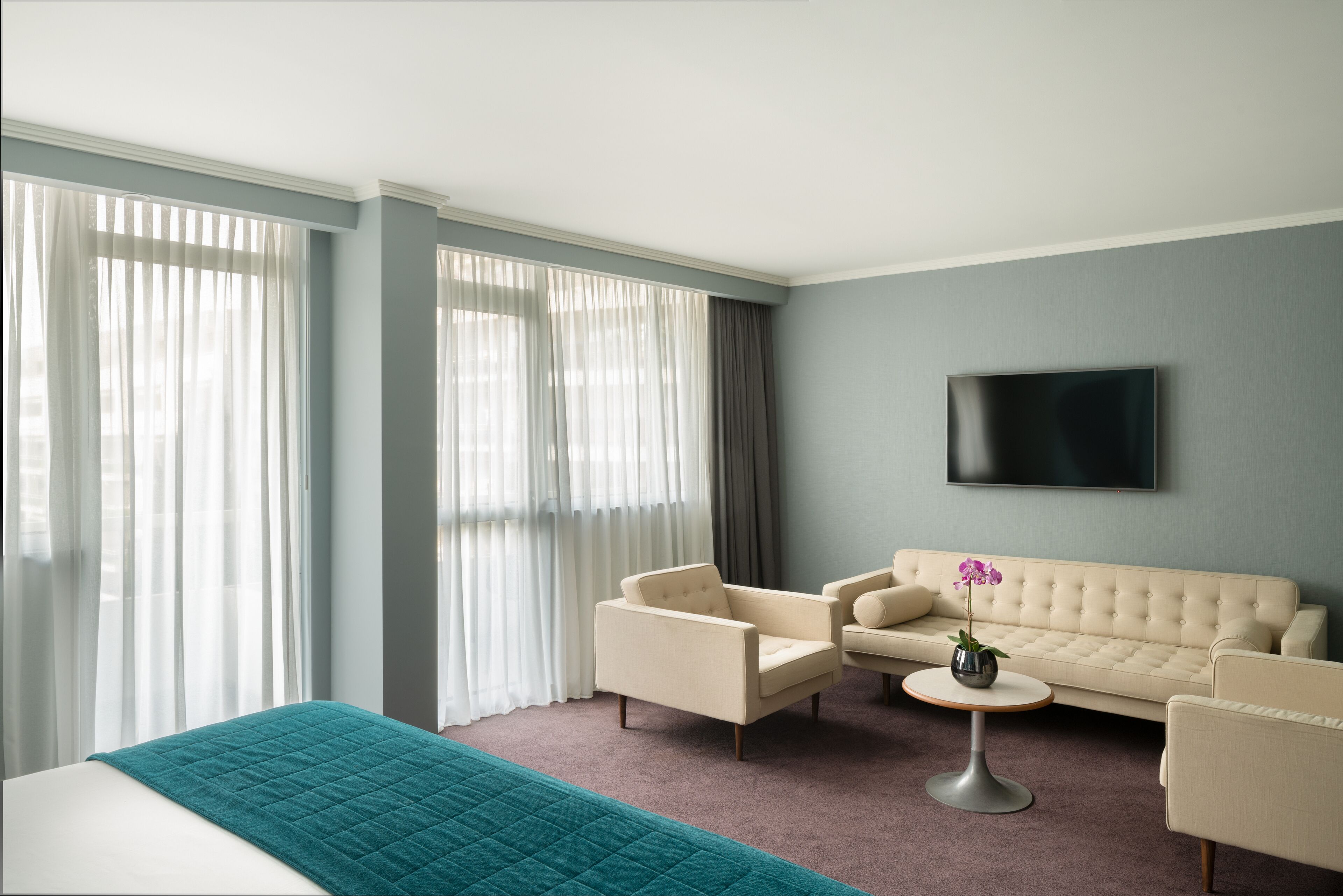 deluxe suite, balcony | 1 bedroom, in-room safe, individually decorated, individually furnished