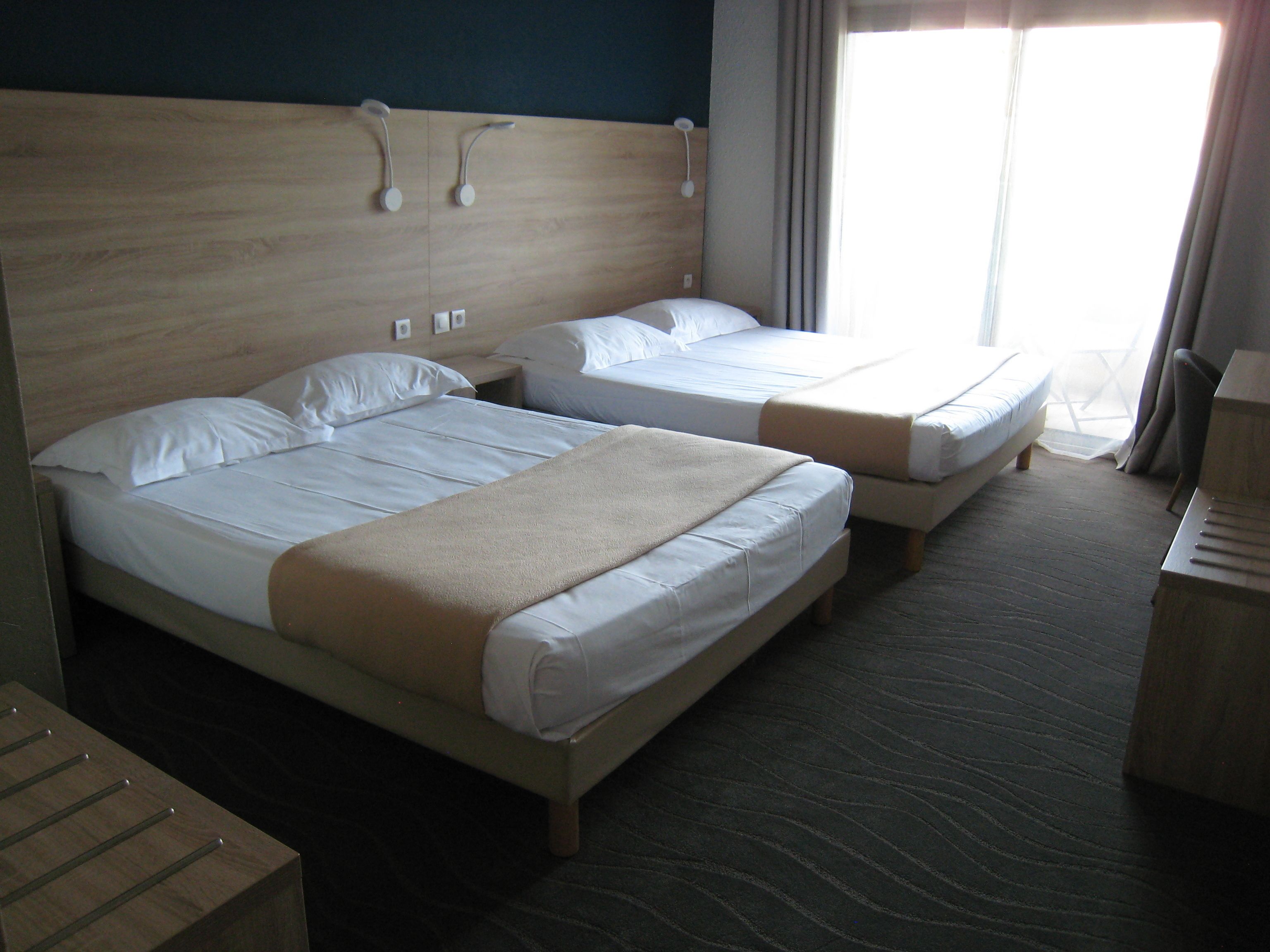quadruple room | 1 bedroom, premium bedding, in-room safe, desk