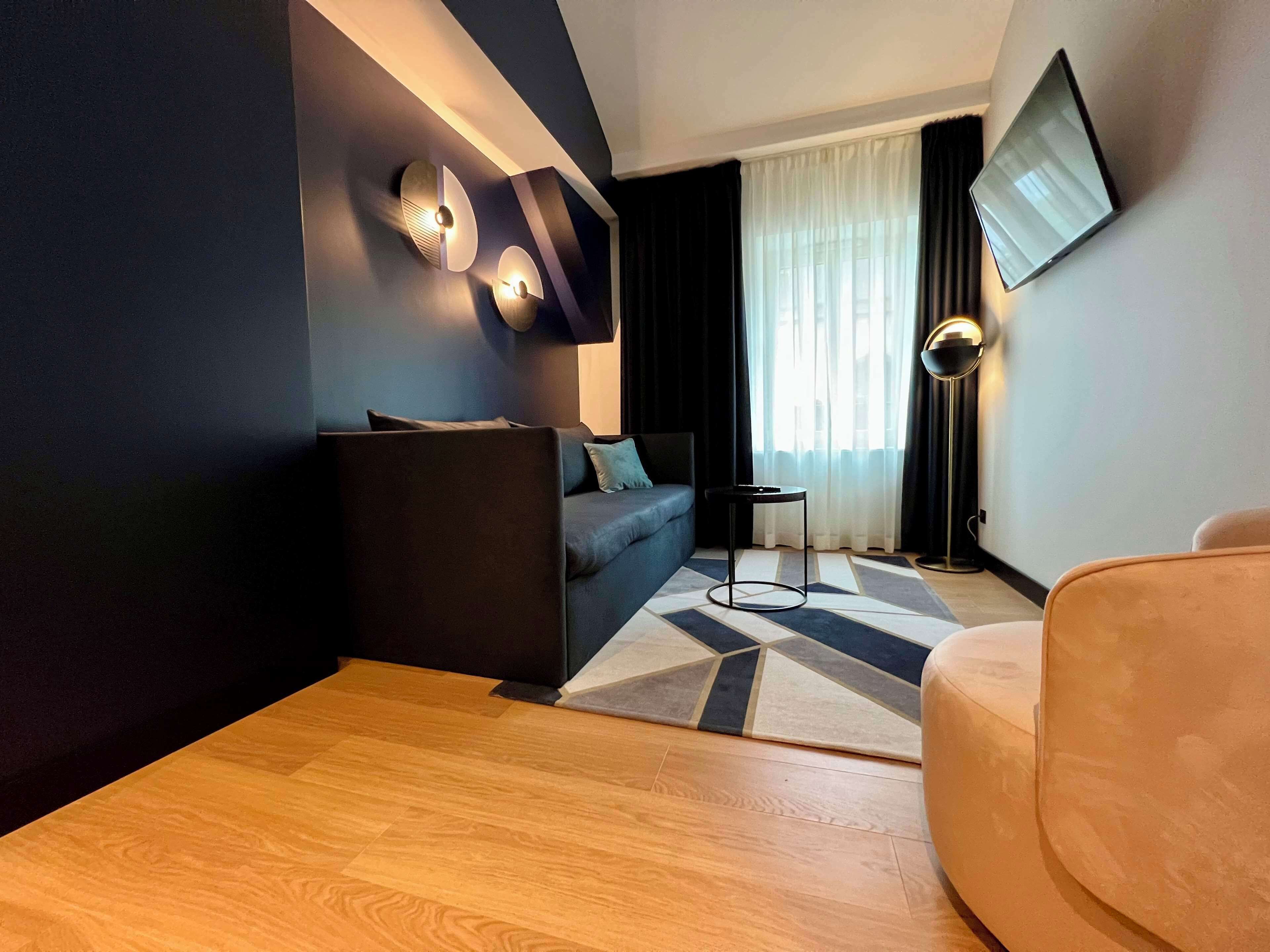 junior suite, 1 king bed, non smoking (with sofabed) | 1 bedroom, minibar, in-room safe, desk