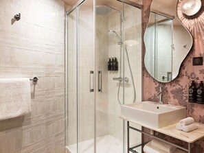 Eco-friendly toiletries, hair dryer, towels