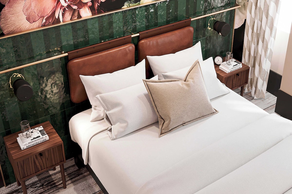 Suite, 1 cama matrimonial y sofá cama | Ropa de cama de alta calidad y camas con pillow-top