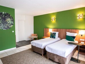 Minibar, lit de bébé (gratuit), lit d’appoint (supplément)