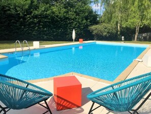 Outdoor pool, open 3:00 PM to 8:00 PM, pool loungers