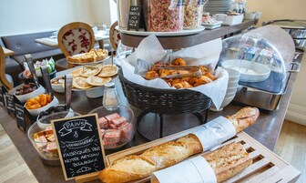 Daily buffet breakfast (EUR 18 per person)