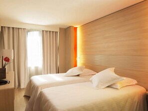 Premium bedding, in-room safe, desk, soundproofing