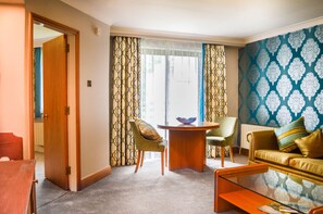 Superior Suite | 1 bedroom, desk, iron/ironing board, free WiFi