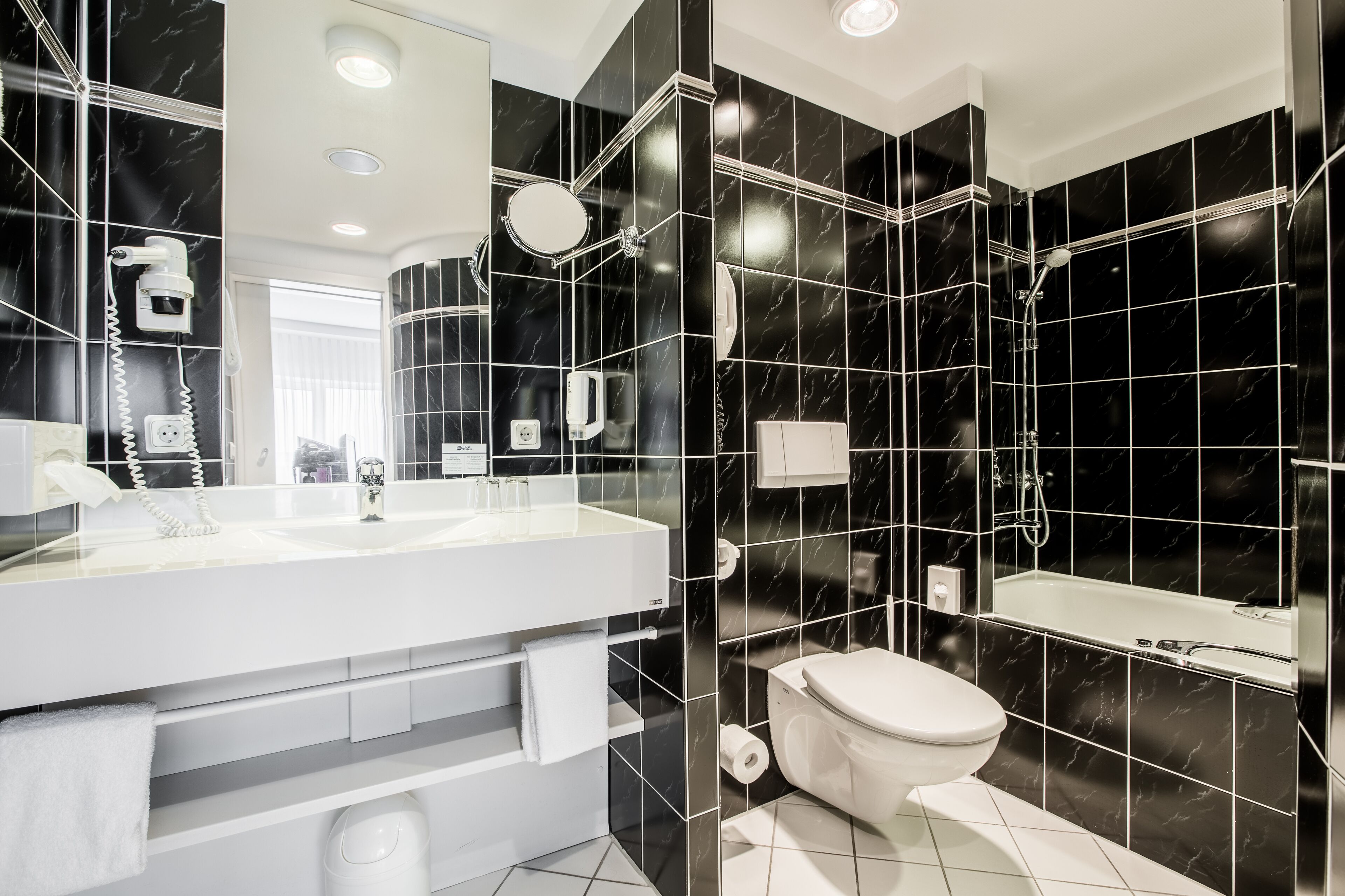 suite | bathroom | hair dryer, towels