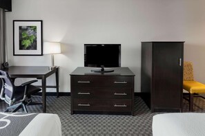 Premium bedding, pillow-top beds, desk, laptop workspace