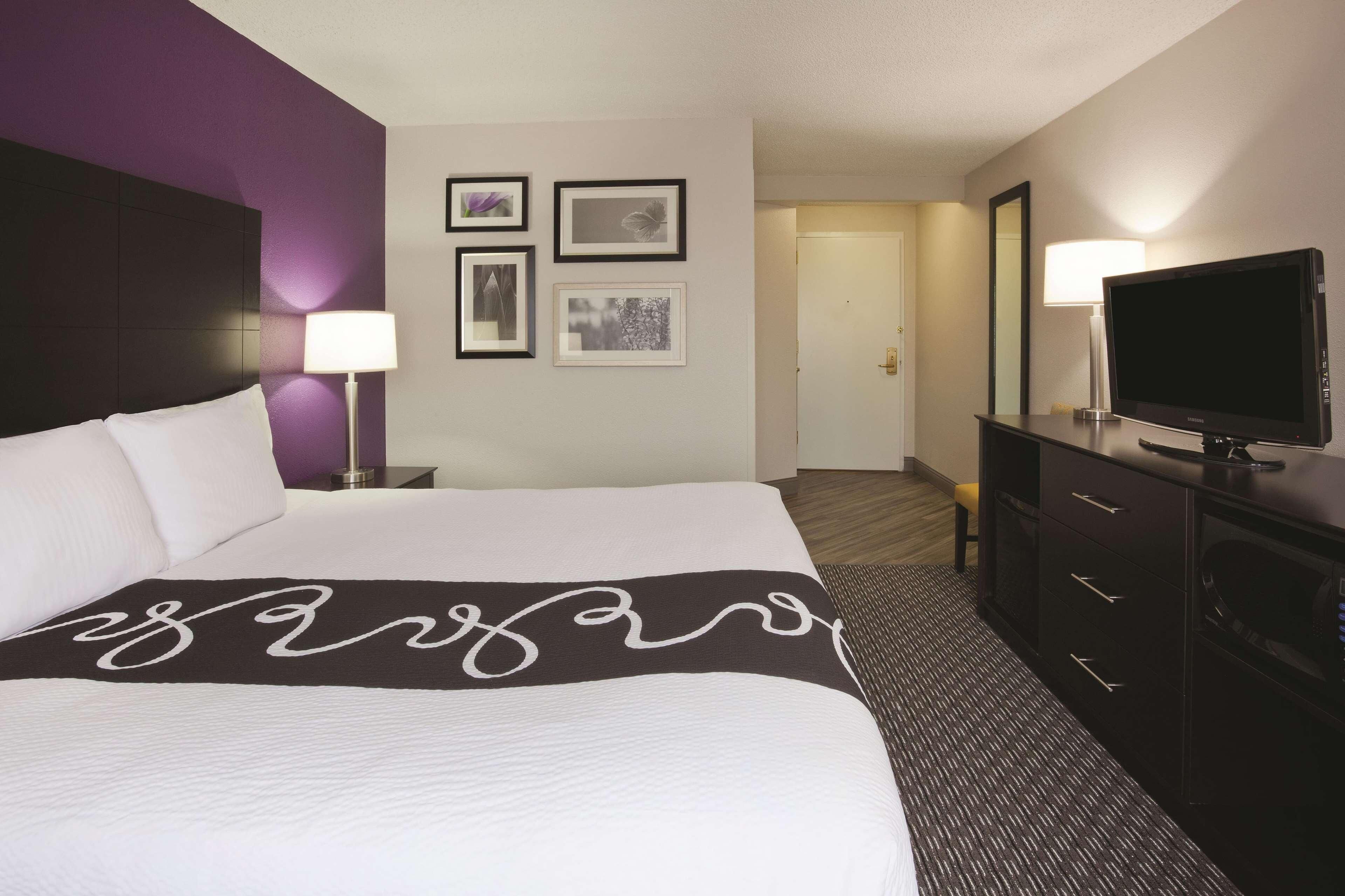 Premium bedding, pillowtop beds, desk, laptop workspace