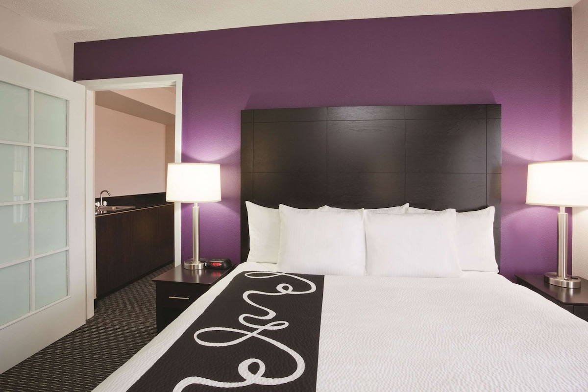 Premium bedding, pillow-top beds, desk, laptop workspace