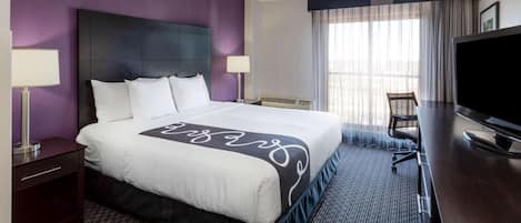 Premium bedding, pillowtop beds, desk, laptop workspace