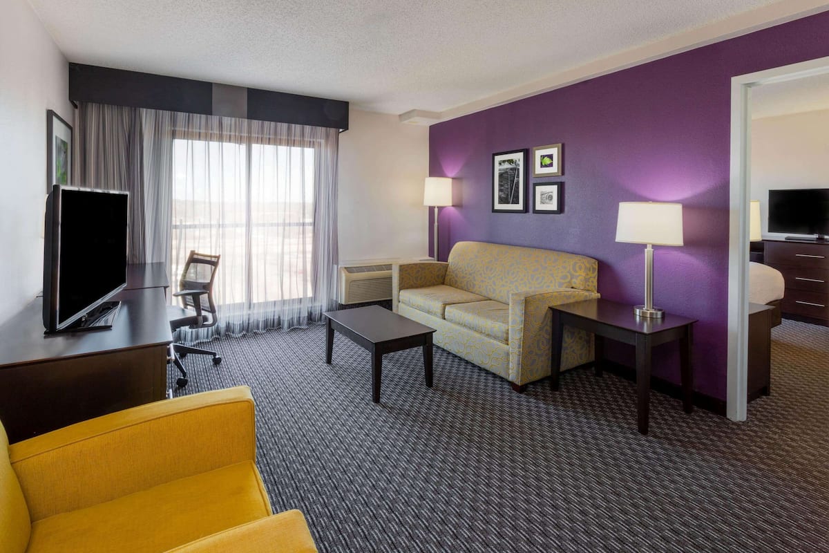Premium bedding, pillow-top beds, desk, laptop workspace