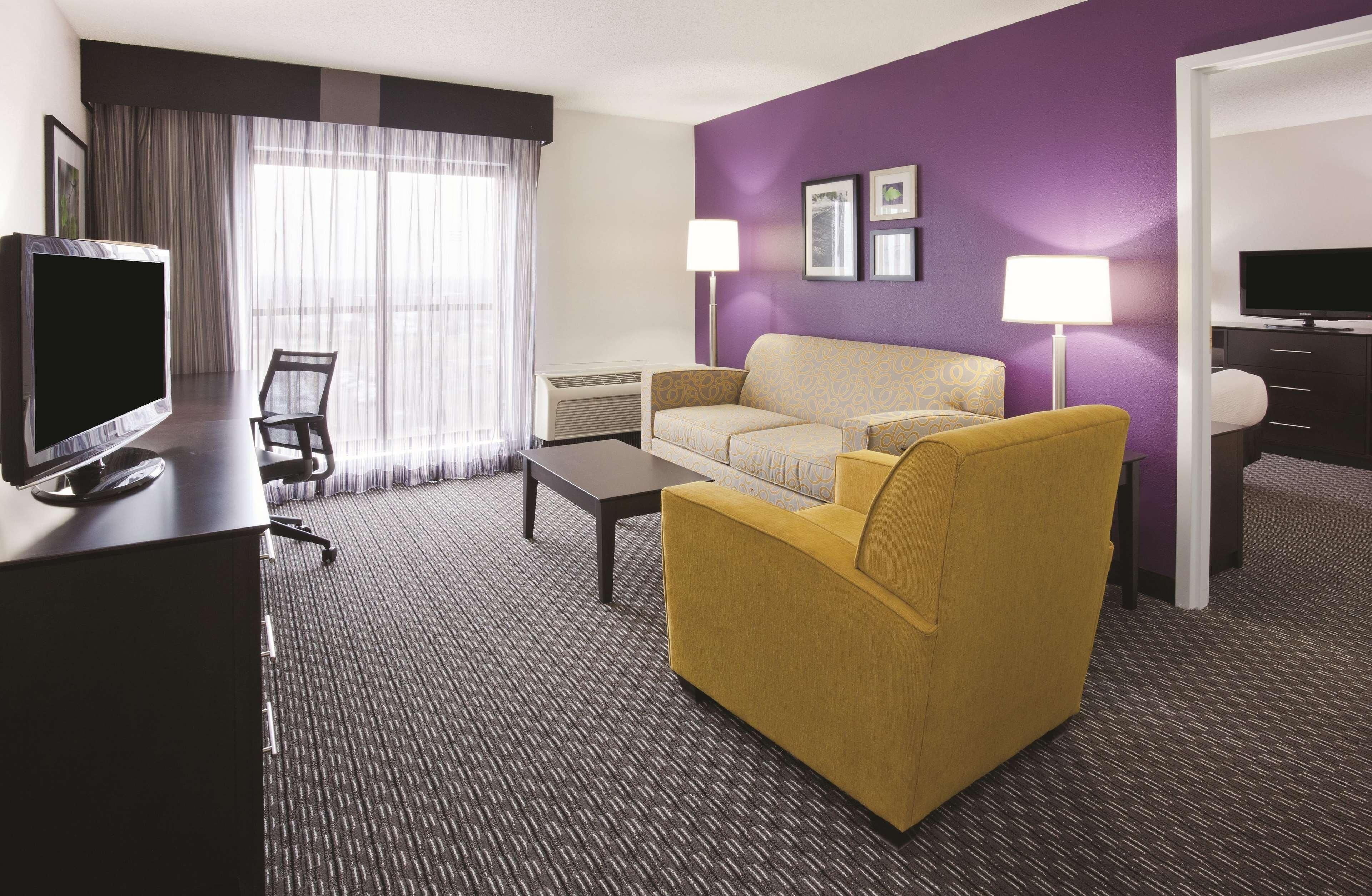 Premium bedding, pillowtop beds, desk, laptop workspace